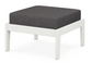 A dark gray cushioned deep seating ottoman with a vintage white frame, made from all-weather materials suitable for outdoor use.