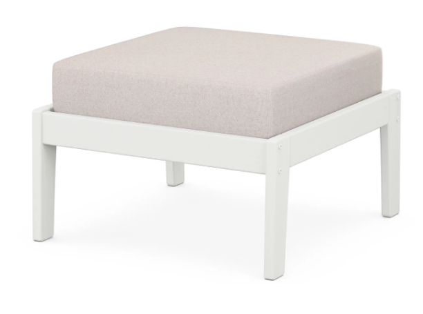 A cream cushioned deep seating ottoman with a vintage white frame, made from all-weather materials suitable for outdoor use.