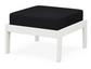 A dark blue cushioned deep seating ottoman with a vintage white frame, made from all-weather materials suitable for outdoor use.