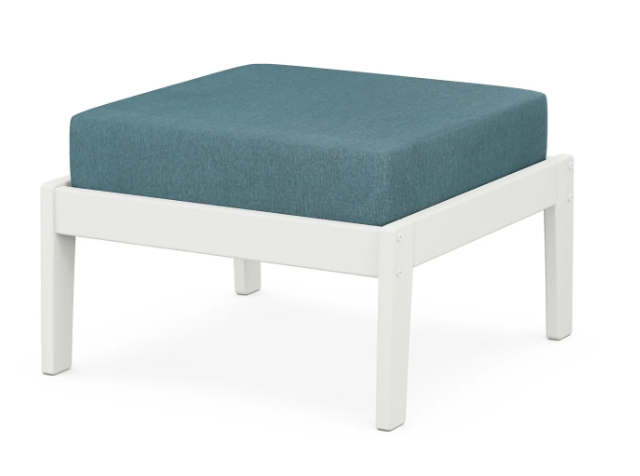 A teal cushioned deep seating ottoman with a vintage white frame, made from all-weather materials suitable for outdoor use.