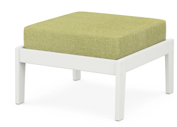 A green cushioned deep seating ottoman with a vintage white frame, made from all-weather materials suitable for outdoor use.