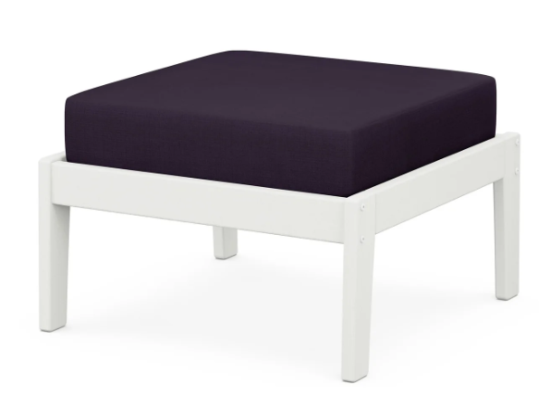 A dark blue cushioned deep seating ottoman with a vintage white frame, made from all-weather materials suitable for outdoor use.
