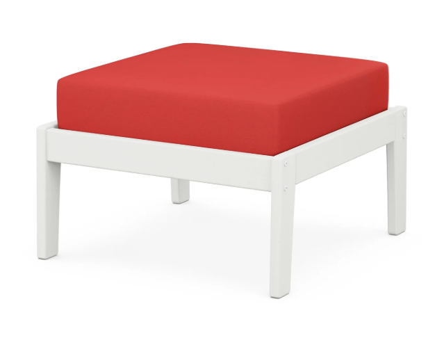 A red cushioned deep seating ottoman with a vintage white frame, made from all-weather materials suitable for outdoor use.