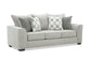 Gray sofa with patterned cushions on a white background