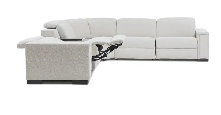 Gray sectional sofa with a reclining feature on a white background