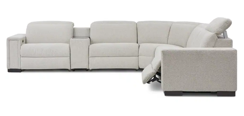 Gray sectional sofa with reclining seats on a white background