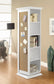 White storage tower with cork board and shelves in a room setting