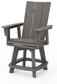 A driftwood Adirondack-style counter and swivel chair with curved back and arms, designed for outdoor use.