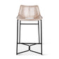 Bar stool with beige seat and black metal frame on a white background