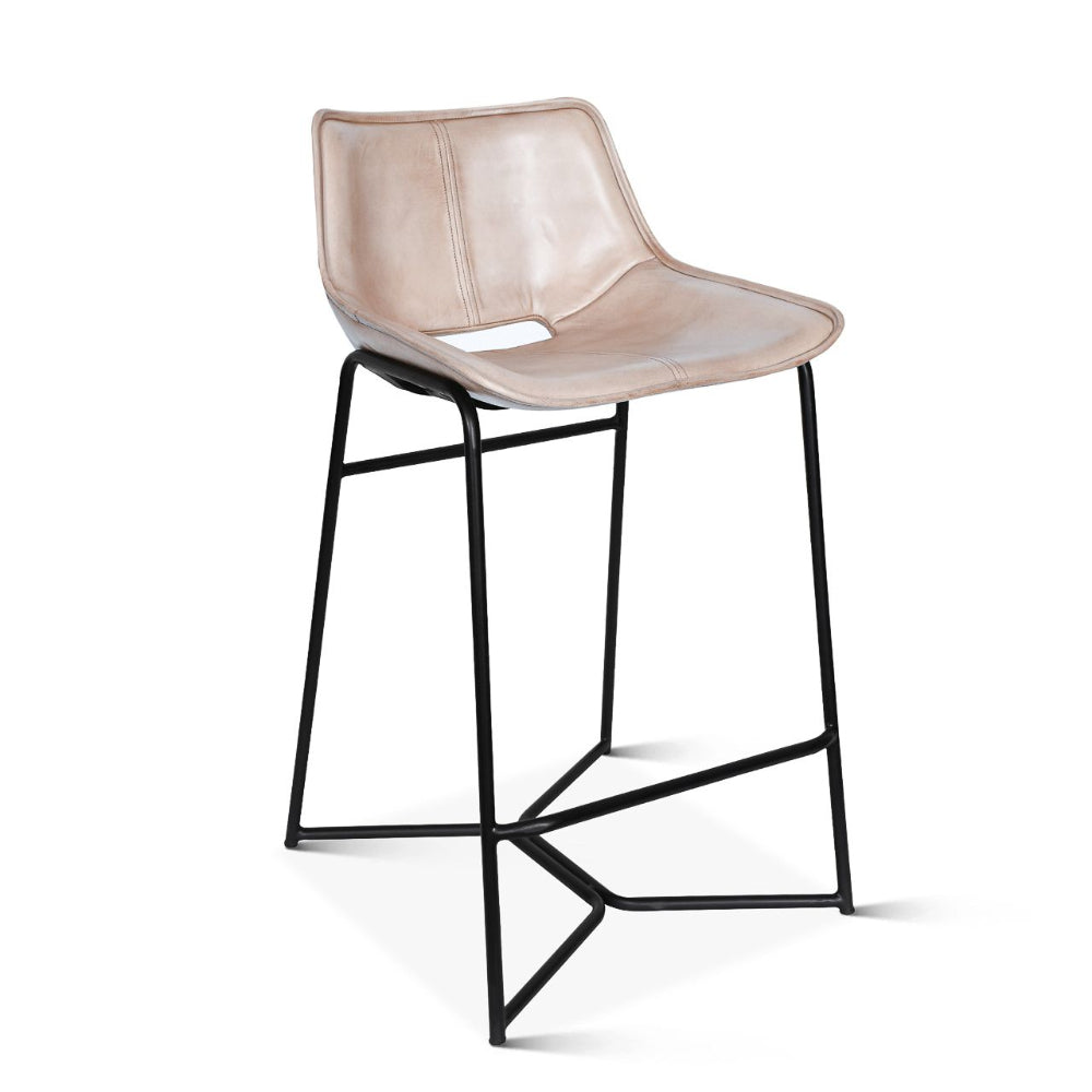 Bar stool with beige seat and black metal frame on a white background