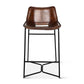 Brown leather bar stool with black metal frame on a white background
