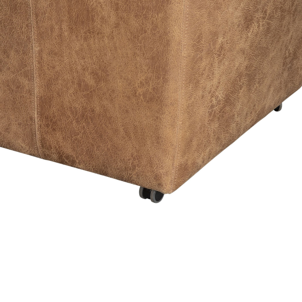 Brown textured cube with wheels on a white background