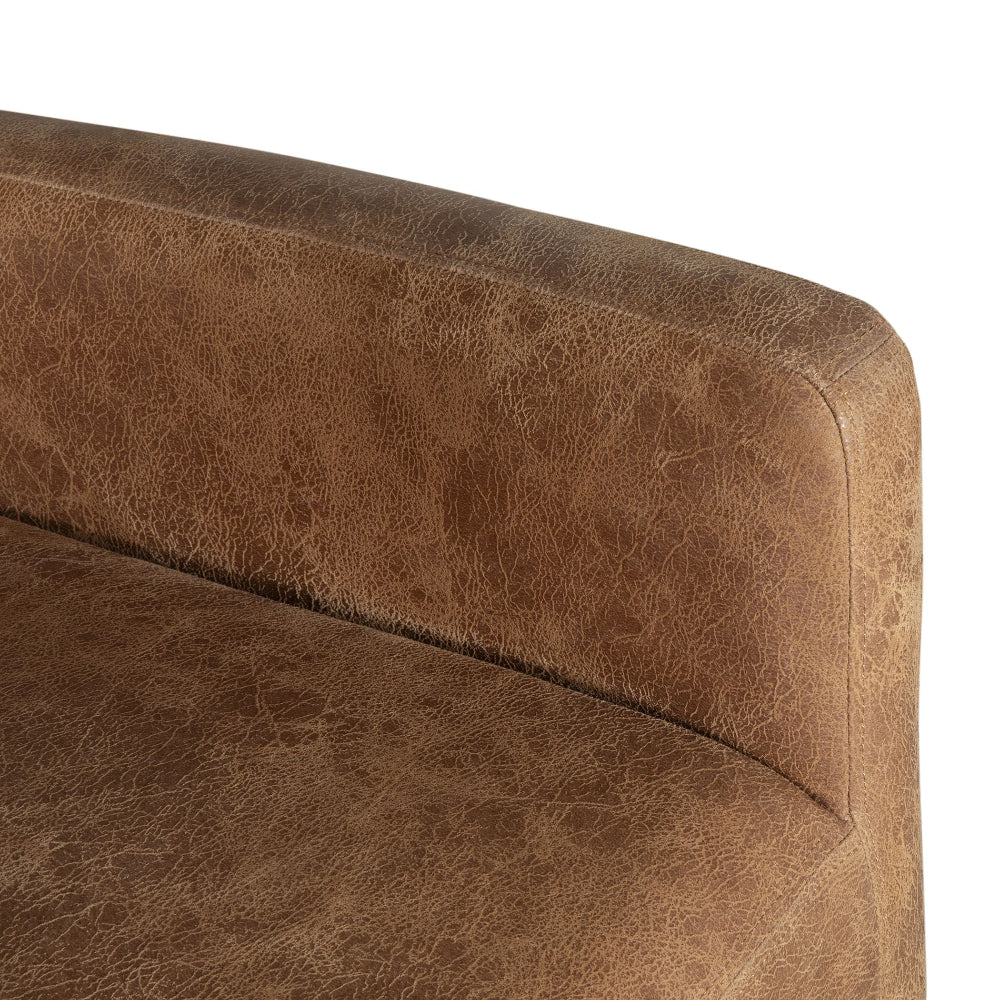 Close-up of a brown leather armchair corner on a white background
