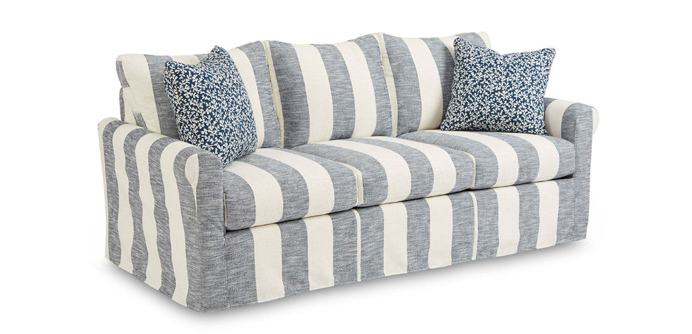 Striped sofa with blue and white pattern on a white background