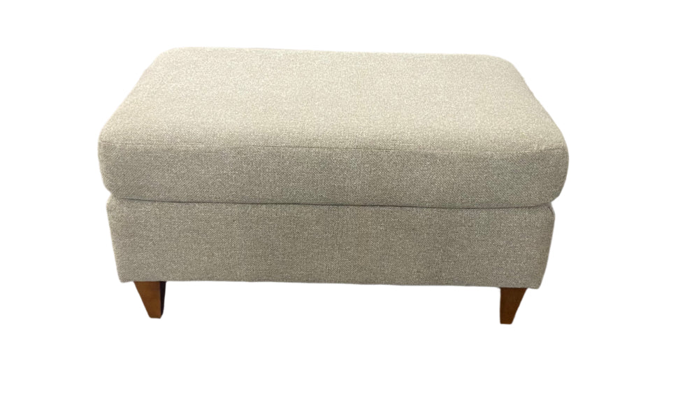 Beige ottoman on a white background