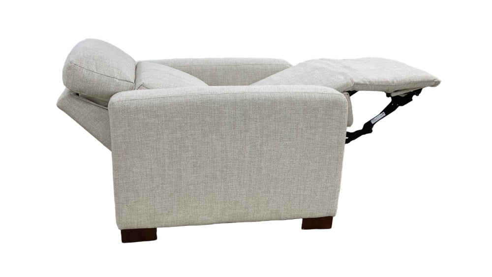 Beige recliner sofa on a white background