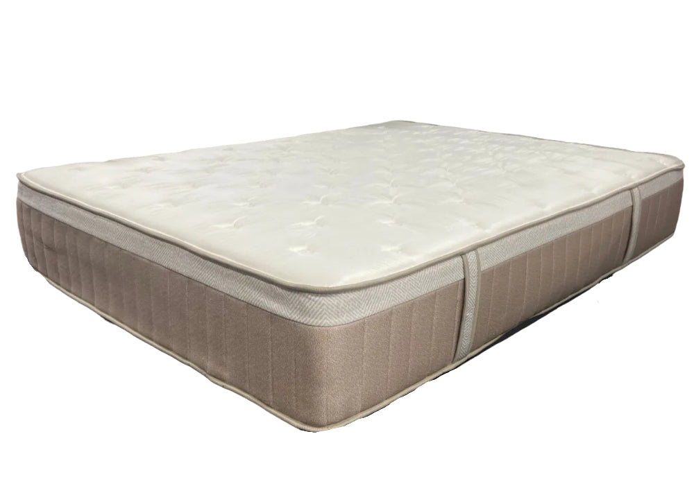 Beige mattress on a white background