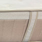 Close-up of a mattress with quilted surface and zipper detail