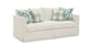 White sofa with patterned cushions on a white background