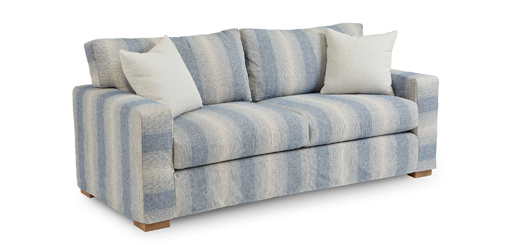 Striped sofa with white cushions on a white background