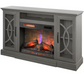 Gray entertainment console with built-in electric fireplace on a white background