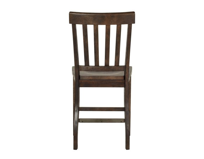Wooden chair with slatted backrest on a white background