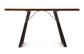 Wooden table with metal legs on a white background