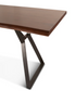 Wooden table with metal legs on a white background