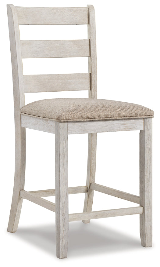 White wooden bar stool with a cushioned seat on a white background