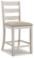 White wooden bar stool with a cushioned seat on a white background