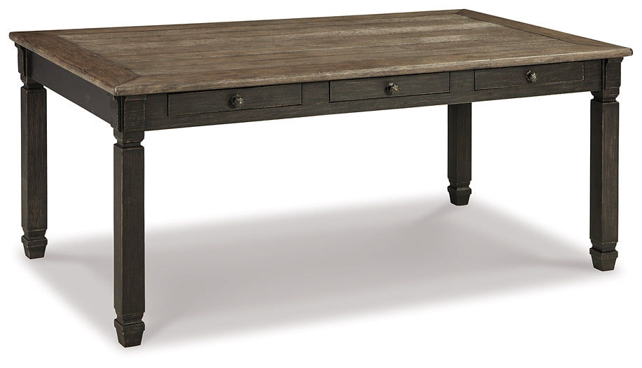 Wooden dining table with dark finish on a white background