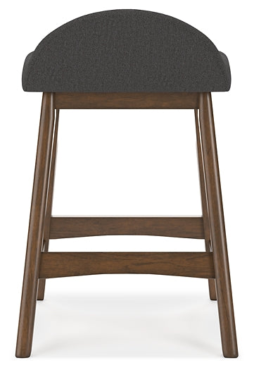 dark gray upholstered stool