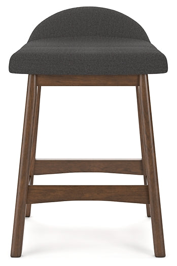 dark gray upholstered stool