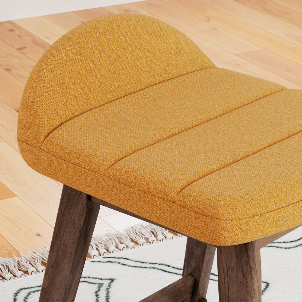 up close yellow upholstered stool