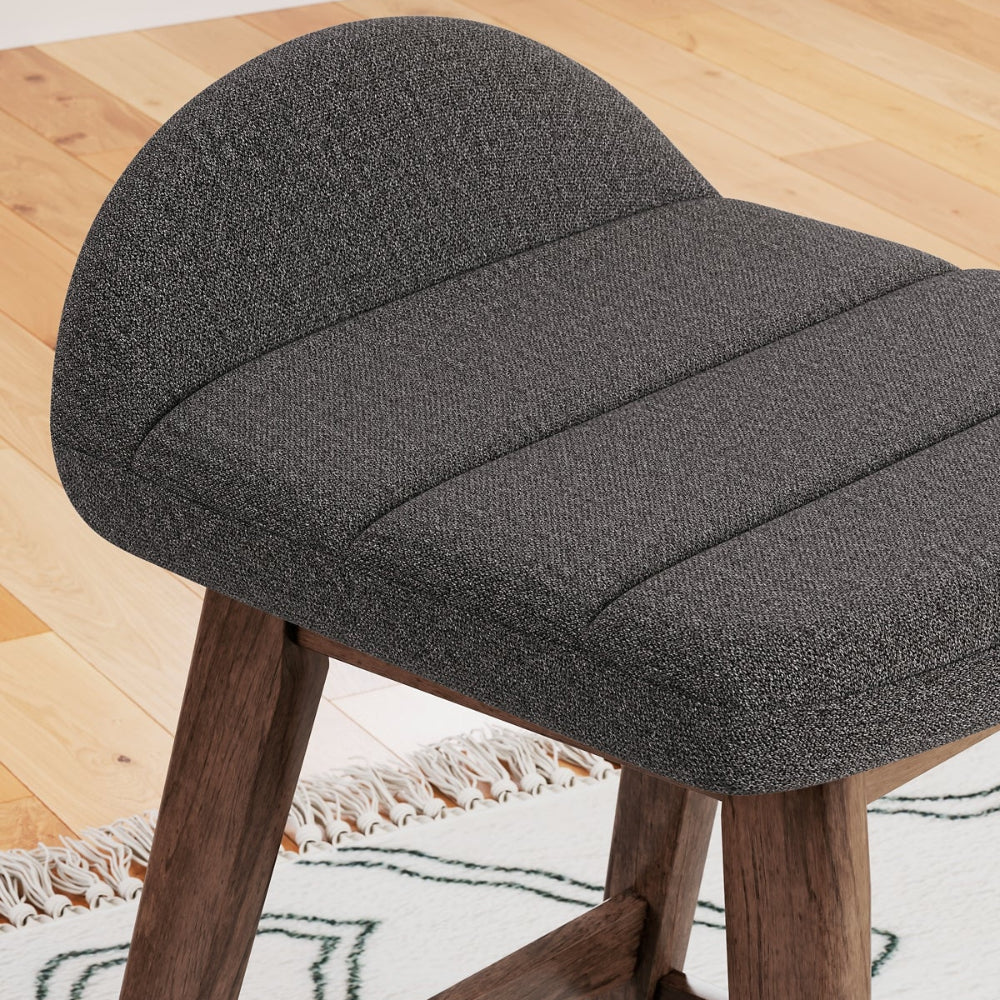 up close dark gray upholstered stool