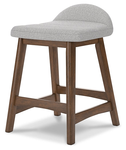 gray upholstered stool