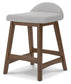 gray upholstered stool