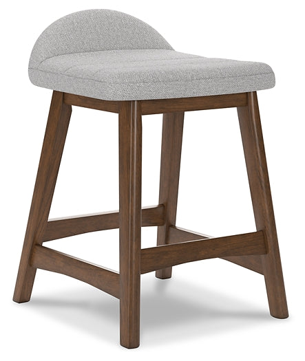 gray upholstered stool