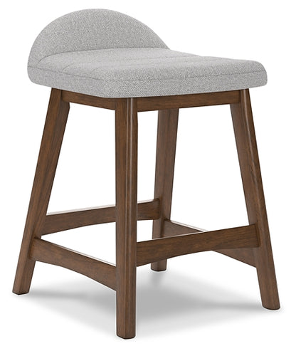 gray upholstered stool