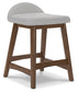 gray upholstered stool
