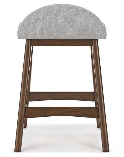 gray upholstered stool