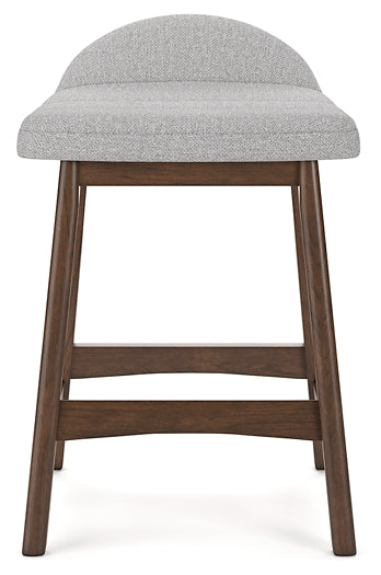 gray upholstered stool