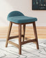 teal upholstered stool