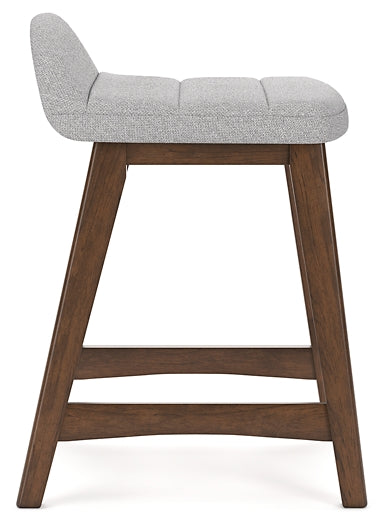 gray upholstered stool