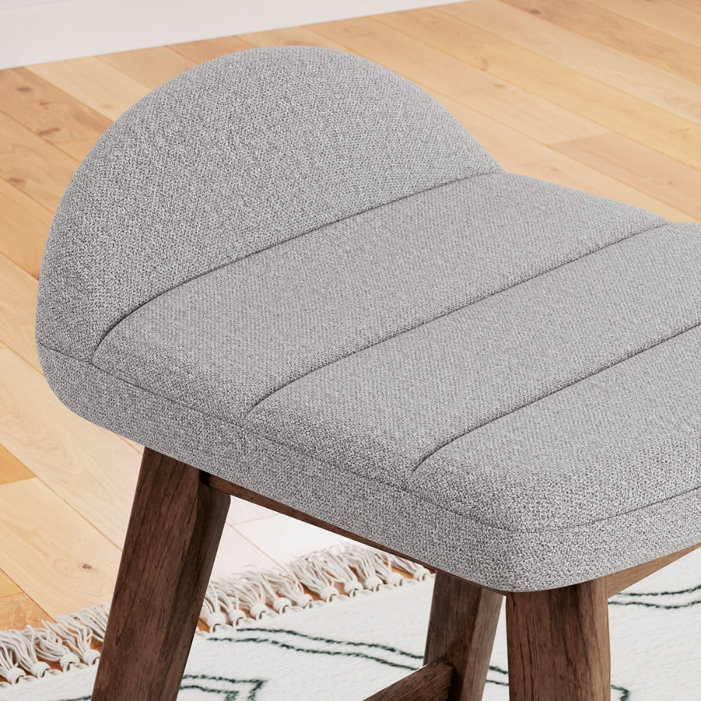 up close gray upholstered stool
