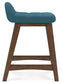 teal upholstered stool