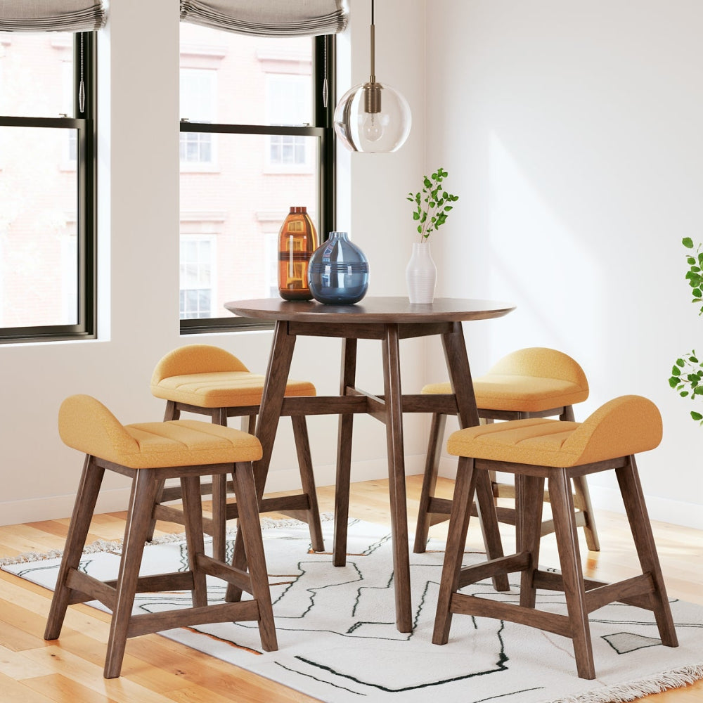 4 yellow upholstered stools around a brown round counter height table