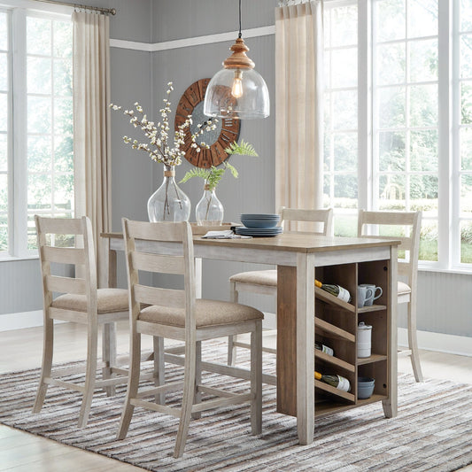 Dining room with wooden table and chairs, rug, and decorative elements.