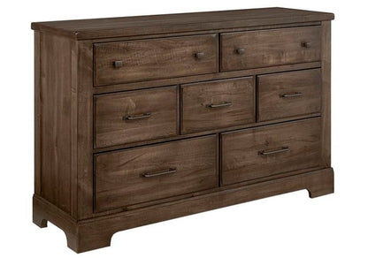 Wooden dresser with multiple drawers on a white background