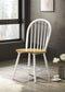 White chair with wooden seat in a room with a window and decorative elements.